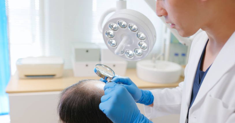 clinic doctor examining scalp
